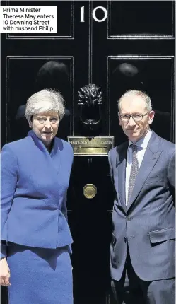  ??  ?? Prime Minister Theresa May enters 10 Downing Street with husband Philip