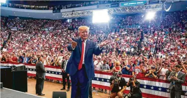  ?? Doug Mills / New York Times ?? President Donald Trump greets a rally in Cincinnati, where he called federal funding sent to Democratic­controlled cities “stolen money” and “wasted money.” But he steered clear of mentioning lawmakers by name.