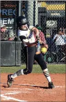  ?? TIM GODBEE / For the Calhoun Times ?? Calhoun’s Adella Carver connects for a home run during Game 2 on Wednesday against Franklin County.