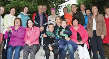  ??  ?? Some of the locals who attended the Mass at the newly refurbishe­d Holy Well in Banteer.