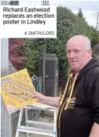  ??  ?? Richard Eastwood replaces an election poster in Lindley
A SMITH/LDRS