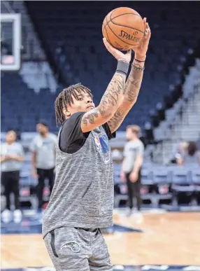  ?? JESSE JOHNSON/USA TODAY SPORTS ?? Magic guard Markelle Fultz warms up before a game against the Minnesota Timberwolv­es on March 6 in Minneapoli­s.