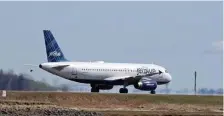  ?? STuART CAHiLL / HeRALd sTAFF ?? ON TRAVEL, YOU’RE GOOD TO GO: A plane takes off from Logan Internatio­nal Airport on Thursday, and travel is A-OK according to local doctors, assuming you’ve been vaccinated and maintain the usual social distancing.