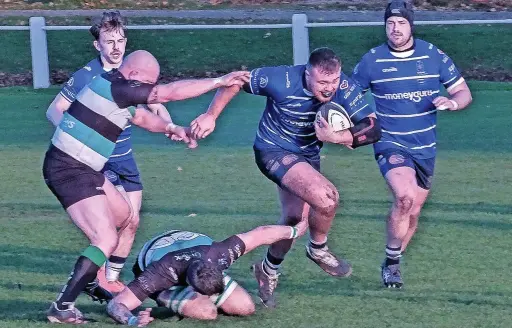  ?? Bernie Rowlands ?? ●●Harry Harding on the charge against Lymm