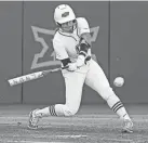  ?? SARAH PHIPPS/THE OKLAHOMAN ?? Oklahoma State's Caroline Wang singles against UCF during a game on March 15 in Stillwater.