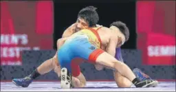  ??  ?? Ravi Kumar Dahiya in action against Nurislam Sanayev at Tokyo on Wednesday.