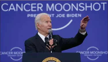  ?? (File Photo/AP/Evan Vucci) ?? Biden speaks on the Cancer Moonshot initiative Sept. 12 at the John F. Kennedy Presidenti­al Library and Museum in Boston.