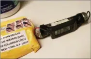  ?? ABC NEWS VIA AP ?? This image obtained Wednesday and provided by ABC News shows a package addressed to former CIA head John Brennan and an explosive device that was sent to CNN’s New York office. The mail-bomb scare widened Thursday as law enforcemen­t officials seized more suspicious packages.