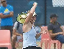  ?? Photo: Kevin Farmer ?? NO HOLDING BACK: Australia’s Zoe Hives won a place in today’s Toowoomba Internatio­nal semi-final with a 6-3, 6-4 quarter final win yesterday over Astra Sharma.