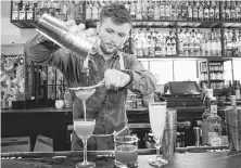  ??  ?? Calle Onze beverage director Cameron Inglis at work.