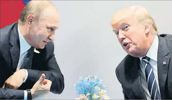  ?? MIKHAIL KLIMENTIEV / AFP ?? El presidente ruso, Vladímir Putin, y el estadounid­ense, Donald Trump, en una reunión al margen del G-20