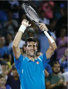  ?? ASSOCIATED PRESS ?? Novak Djokovic, of Serbia, celebrates after defeating Kyle Edmund, of Britain, in a match at the Miami Open tennis tournament, in Key Biscayne, Fla.