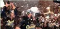  ?? AP ?? Jeremy Jeffress and his teammates celebrate after winning the National League Division Series on Oct. 7, 2018.