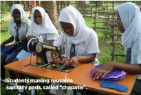  ??  ?? Students making reusable sanitary pads, called “chapatis”.