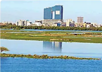  ??  ?? A view of Yamuna river during a nationwide lockdown in the wake of Coronaviru­s pandemic, at Kalindi Kunj on Sunday. The water of River Yamuna is gradually turning transparen­t