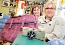  ?? CHRIS HALLIDAY/ORANGEVILL­E BANNER ?? Shelburne, Ont., residents Tonya Ritchie, left, and Janet Piper. Piper’s father’s movie reels were found in a suitcase that Ritchie bought in Newfoundla­nd.