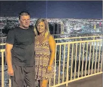  ?? SUBMITTED PHOTO ?? Shawn (left) and Amanda Hackett of Benoit’s Cove were in their Las Vegas hotel room during a trip to the Nevada city for their 23rd wedding anniversar­y last month.