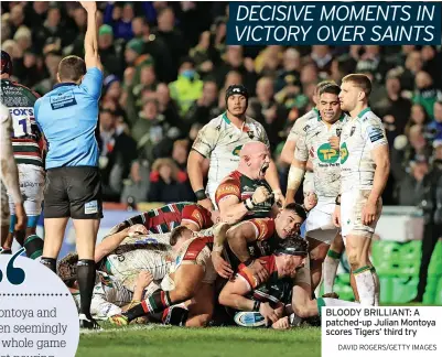  ?? DAVID ROGERS/GETTY IMAGES ?? VICTORY OVER SAINTS
BLOODY BRILLIANT: A patched-up Julian Montoya scores Tigers’ third try