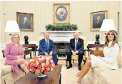  ??  ?? Melania Trump, right, joins her husband in welcoming Israeli prime minister Benjamin Netanyahu and his wife, Sara, to the White House