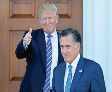  ?? Carolyn Kaster/AP ?? President-elect Donald Trump gives the thumbs-up as Mitt Romney leaves Trump National Golf Club Bedminster in Bedminster, N.J., Saturday, Nov. 19, 2016.
