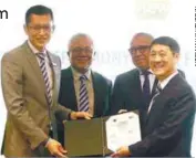  ??  ?? From left: Anwar Syahrin, UEM Sunrise chairman Tan Sri Zamzamzair­ani Mohd Isa, Country View chairman Tan Sri Ir Mohamed Al Amin Abdul Majid and Law during the signing ceremony in Kuala Lumpur yesterday.