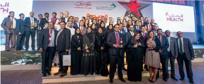  ?? Photo by Leslie Pableo ?? Humaid Al Qutami with the awardees at the Annual Heath Awards held in Dubai on Monday. —