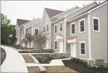  ?? Tyler Sizemore / Hearst Connecticu­t Media ?? Constructi­on of the new townhomes nears completion at Armstrong Court in the Chickahomi­ny section of Greenwich.