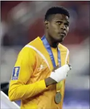  ?? BEN MARGOT — THE ASSOCIATED PRESS ?? With bandages concealing a hand laceration he suffered while playing for Jamaica in the Gold Cup final against the United States, Union goalkeeper Andre Blake will miss Saturday’s visit to New England.