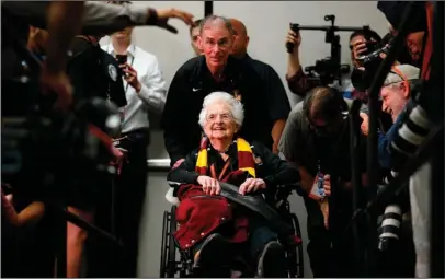  ?? The Associated Press ?? QUESTION AND ANSWER: Loyola’s Sister Jean Dolores Schmidt arrives at a news conference for the Final Four NCAA college basketball tournament on Friday in San Antonio.