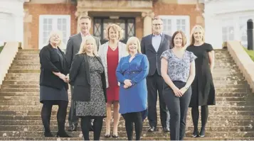  ??  ?? 0 Barrhead Travel’s board gather in Ayrshire, with president Jacqueline Dobson front-centre