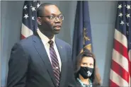  ?? THE ASSOCIATED PRESS FILE PHOTO ?? Lt. Gov. Garlin Gilchrist II, accompanie­d by Gov. Gretchen Whitmer, right, speaks during an address to the state in Lansing, Mich.