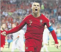  ?? FRANCISCO SECO — THE ASSOCIATED PRESS ?? Portugal star Cristiano Ronaldo celebrates the first of his three goals in Friday’s Group B draw against rival Spain at the World Cup.