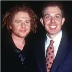  ??  ?? Loyal: Hucknall and Tony Blair in 1995