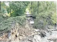  ?? F: RUHNAU ?? Bei den Überschwem­mungen 2021 wurde auch dieser Weg im Rotthäuser Bachtal zerstört.