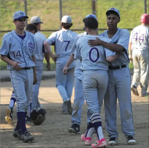  ?? Photos by Ernest A. Brown ?? The St. Raphael baseball team wasn’t in a particular­ly good mood after dropping a 7-2 decision to visiting Narraganse­tt. Cayden Dupras (7, below) and the Saints needed a victory over Ed Blessing (sliding, below) and the Mariners to guarantee a Division...