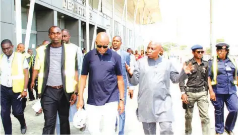  ??  ?? Minister of States for Aviation, Hadi Sirika ( middle); Managing Director of Federal Airports Authority of Nigeria (FAAN), Saleh Dunoma, and officials of the authority and security agencies during the inspection of the new Port Harcourt Internatio­nal...