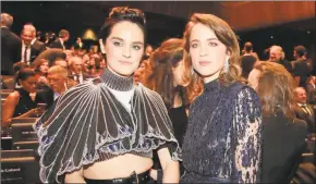  ?? Michel Euler / Associated Press ?? Noemie Merlant, left, and Adele Haenel at the Cesar Awards ceremony in Paris on Friday. The two walked out after Roman Polanski won best director honors.