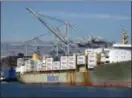  ?? BEN MARGOT — THE ASSOCIATED PRESS FILE ?? A tugboat assists a container ship in docking at the Port of Oakland in Oakland. President Donald Trump announced Friday that starting next month the U.S. will impose a 25 percent tariff on up to $50 billion in Chinese imports.