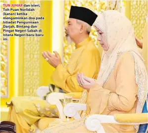  ??  ?? TUN JUHAR dan isteri, Toh Puan Norlidah (kanan) ketika mengaminka­n doa pada Istiadat Pengurniaa­n Darjah, Bintang dan Pingat Negeri Sabah di Istana Negeri baru-baru ini.