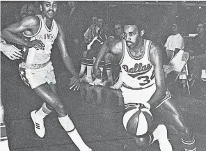  ?? REMEMBER THE ABA ?? Maurice McHartley, right, playing for the Dallas Chaparrals, now lives in subsidized housing in Atlanta and hopes the NBA will step up and give pensions to former ABA players.