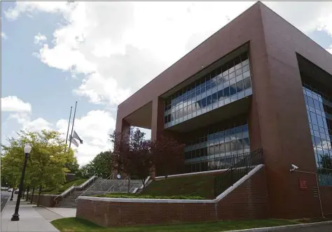  ?? H John Voorhees III / Hearst Connecticu­t Media ?? The state Superior Court building in Danbury. Catherine Koeppel, a 36-year-old state police sergeant charged with leaving the scene of a motor vehicle crash last month, was due to appear for her arraignmen­t Friday.