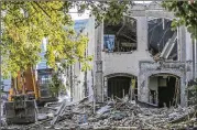  ?? JOHN SPINK / JSPINK@AJC.COM ?? Developers of a “Margaritav­ille”-themed hotel, timeshare rental and restaurant acquired a permit earlier this year to demolish the historic building at 152 Nassau Street in downtown Atlanta.