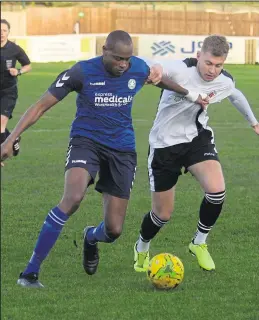  ?? Picture: Chris Davey FM23639177 ?? Faversham’s Luke Griffiths challenges for the ball against Whyteleafe