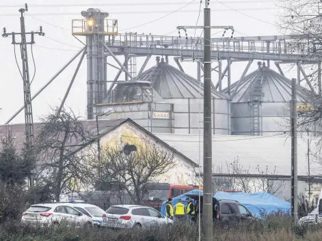  ?? ?? Police investigat­e the site of a missile strike, Przewodow, eastern Poland, Nov. 17, 2022.