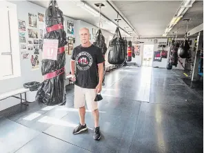  ?? BOB TYMCZYSZYN TORSTAR ?? Bruce Greenlaw at the St. Catharines Boxing Club gym which has been adapted for virus precaution­s.