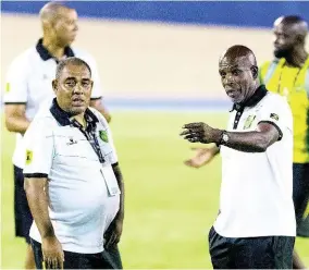  ??  ?? Head coach of Jamaica’s senior women’s football team, Hue Menzies (left), and his assistant coach Lorne Donaldson.