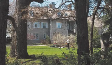  ?? CP FILE PHOTO ?? A gardener works on the grounds at the Prime Minister’s residence at 24 Sussex Dr. in Ottawa in 2008.