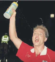  ??  ?? Mick Halsall celebrates the famous play-off semi-final win at Huddersfie­ld.