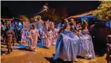  ??  ?? Afro-Colombian children in costumes take part in the ‘Adoracione­s al Nino Dios’ celebratio­ns.