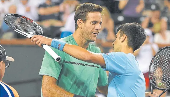  ?? AFP ?? Amigos. Del Potro fue eliminado por Djokovic, que le ganó en tres sets en los octavos de final de Indian Wells, el primer Masters 1000 del año.